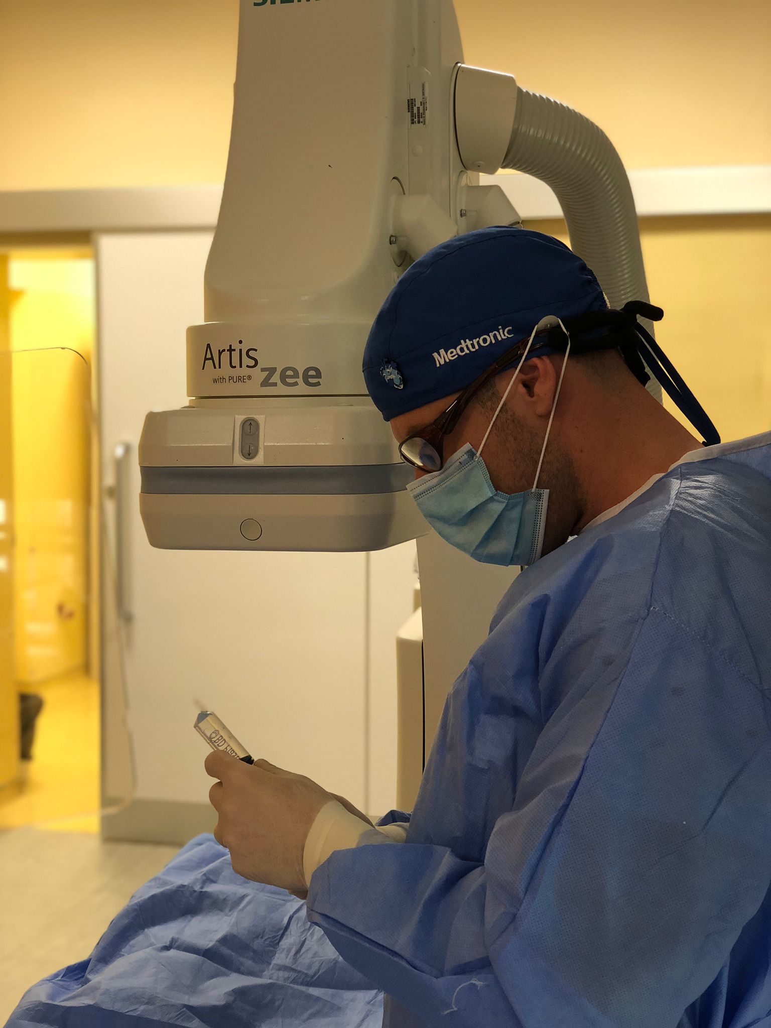 Nick in sterile O.R. performing surgical procedure—clinical expertise, patient safety, healthcare operations, HIPAA-compliant workflow
